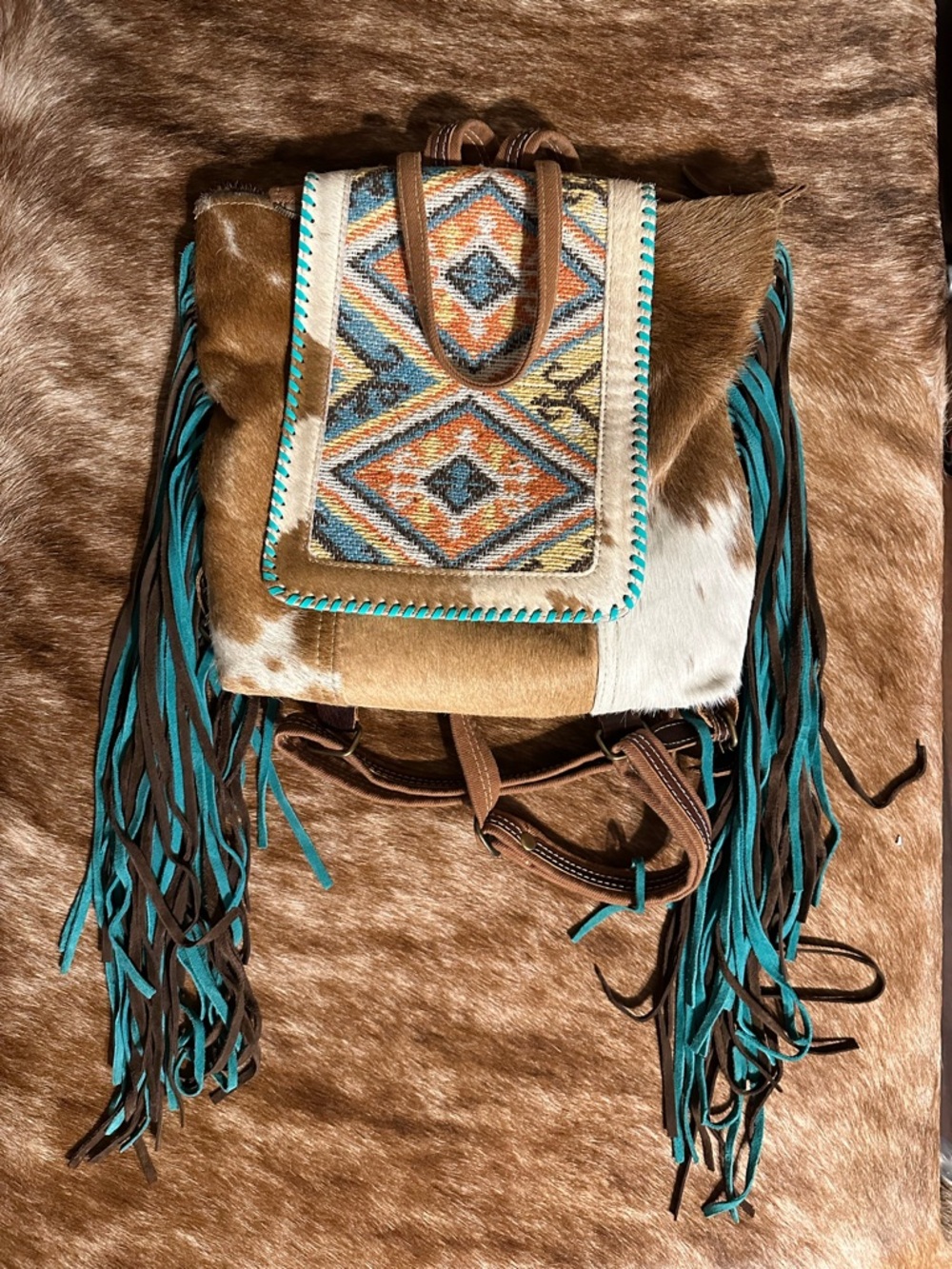 Myra Bag Fringed Cowhide Backpack with Turquoise Accents
